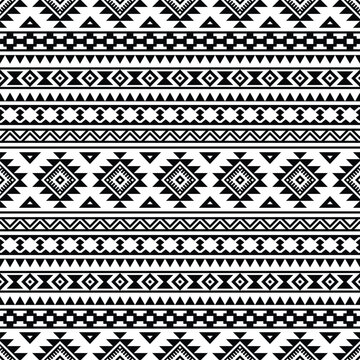 Ethnic geometric abstract motif background design. Seamless pattern in folk art style. Aztec Navajo Native American. Design for textile, fabric, clothing, curtain, rug, ornament, wrapping, wallpaper.