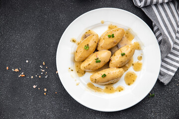 fish quenelles white sauce meal food snack on the table copy space food background rustic top view