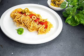 olives spaghetti meatless tomato sauce no meat green meal food snack on the table copy space food background rustic top view