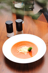 Red tomato soup with noodles. Tasty and fresh lunch, traditional soup