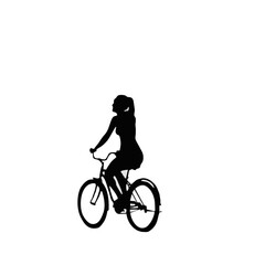 silhouette of a child riding a bicycle