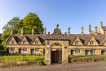 Fototapeta na wymiar The gabled almshouses in Church Street, Chipping Norton, Cotswolds, England were built by Henry Cornish in 1640.