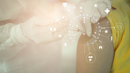 Doctor's hand in glove holding the needle of the vaccine injected into the skin arm of the patient