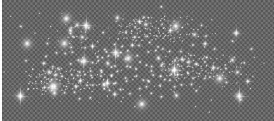 The dust sparks and white stars shine with special light. Vector sparkles on a transparent background. Christmas light effect.
