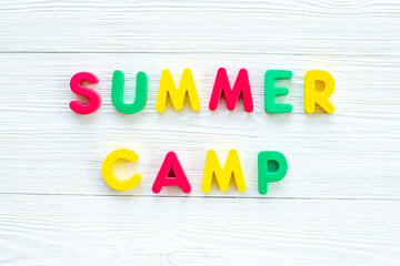 Words Summer Camp made from colorful letters. Summer kids vacation concept