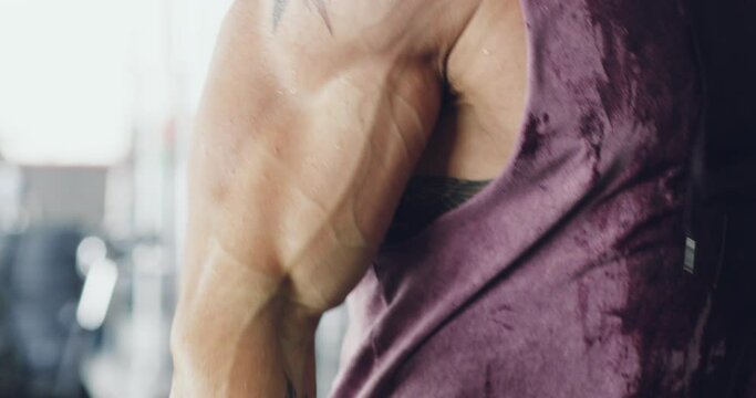 Weight lifting, muscle and hands with weights for workout, bodybuilder training and intense exercise. Fitness, sports and closeup of man lift heavy dumbbells with power, strength and strong arms