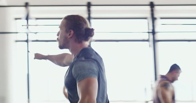 Celebration, workout and group of people in the gym for a fitness training, class or challenge. Happy, motivation and personal trainer winning goals with athlete clients after a exercise for sports