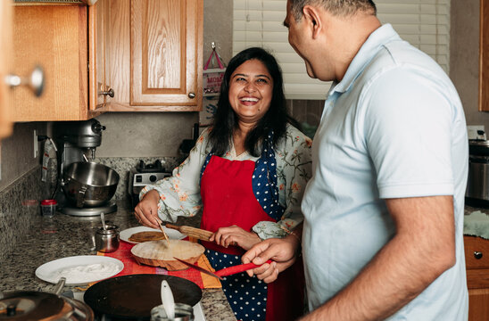 South Asian couple at home 