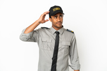 African American safeguard over isolated white background having doubts and with confuse face...