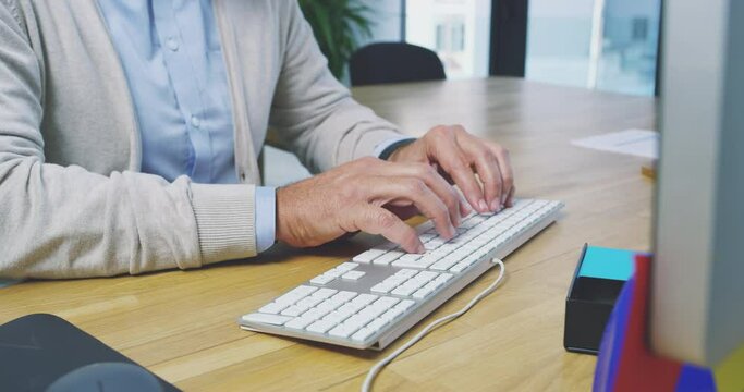 Hands, mature man and typing on computer in office for data planning, online admin and internet email. Worker, desktop keyboard and technology for seo research, website and business management