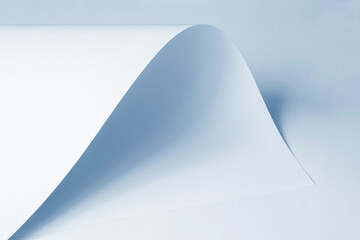 A large sheet of white paper of cold color.