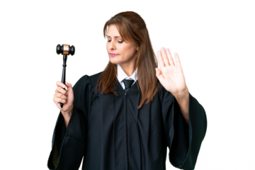 Judge caucasian woman over isolated background making stop gesture and disappointed