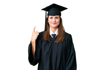 Middle age university graduate woman over isolated background pointing with the index finger a great idea
