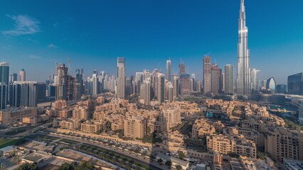 Naklejka na ściany i meble Dubai Downtown morning timelapse with tallest skyscraper and other towers