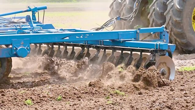 Plowing Of Field With Farm Equipment, Slow Motion