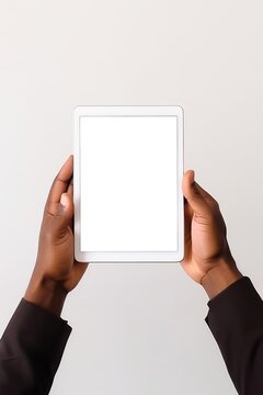 A person holding a tablet with a white screen mock up Generative AI