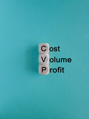 CVP cost volume profit symbol. Concept words CVP cost volume profit on wooden cubes on a beautiful...