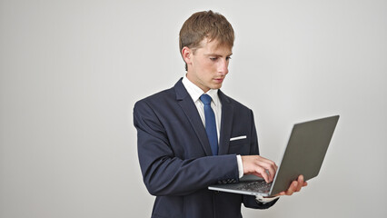 Young caucasian man business worker using laptop over isolated white background
