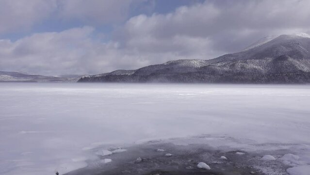 Frozen Lake Akan and Mt. Oakan in Midwinter