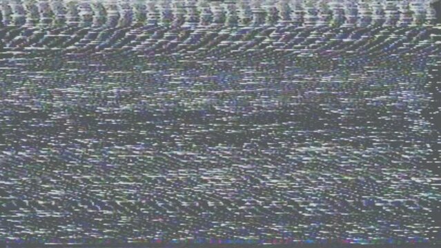 Interference and distortion of the image on the screen from an old VHS cassette. No signal. The end of the video film with artifacts and flickering. The effect of an old damaged film.