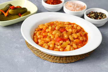 Traditional delicious Turkish foods; Dried bean (Kuru fasulye). Hot turkish bean stew with a tasty tomato sauce