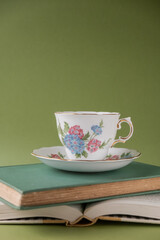 Teacup on book
