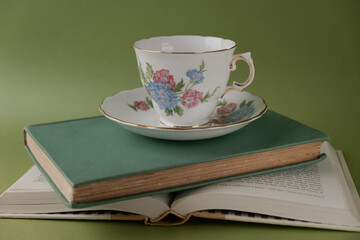 Teacup on book
