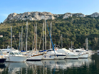 Fototapeta na wymiar View of the sea and yachts on the summer day. Cagliari. Sardinia. Italy.