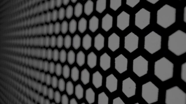 Black hexagonal honeycomb background. Abstract hexagon geometry background. Useful as abstract background.