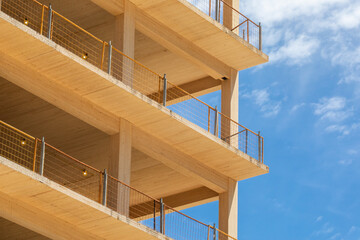 Close up of structural components of an engineered timber multi story green, sustainable...