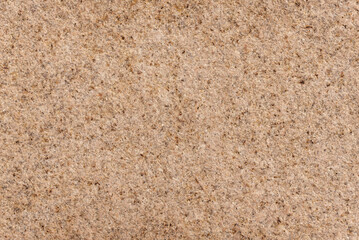 Stone texture of natural brown granite, background.