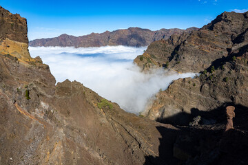 Aerial panoramic above the clouds at the beautiful Caldera de Taburiente National Park in La Palma - Canary Islands	