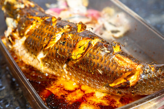 Traditional mullet fish ( Mugil cephalus, Chelon labrosus, Agonostomus monticola, Liza ramada or Mugil curema). Roasted tainha fish.
