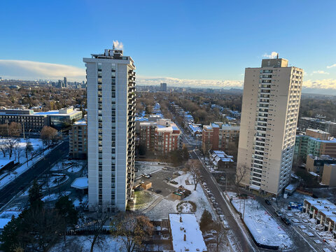 View of Davisville neighborhood covered in snow during snowy winter. Toronto, Ontario, Canada.