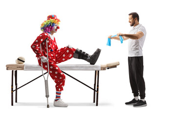Physical therapist showing exercise to a clown with an injured leg