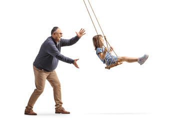 Grandad pushing a little girl on a swing - obrazy, fototapety, plakaty