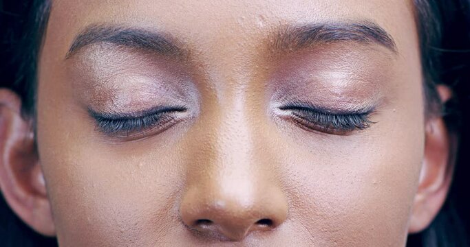 Make up, closeup on eyes and beauty, woman blinking with mascara and microblading for luxury salon treatment. Eyeshadow, zoom and Indian model for eye care, cosmetics eyeliner product and skincare.