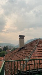 Chimney on the roof in Sarajevo on a sunset 