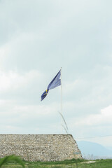 Fototapeta na wymiar Bosnian flag on a fortress 