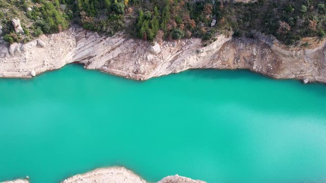 Panoramic beautiful vertiginous impressive aerial view of Congost de Mont-Rebei, Famous Canyon and gorge surrounded by vegetation on river in Catalonia, in Pyrenees, Spain. High quality 4k footage