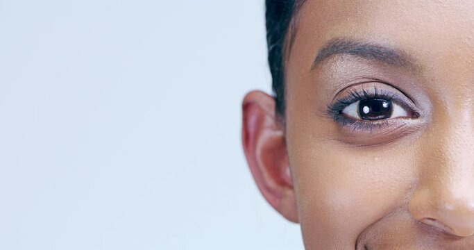 Makeup, closeup on eye and happy woman in mockup looking up with mascara, microblading and luxury salon beauty. Eyeshadow, zoom on face and model with skin cosmetics product for eyes and skincare.