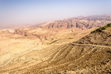 Fototapeta na wymiar Landscape at King's Highway in Jordan. The King’s Highway was a trade route of vital importance in the ancient Near East, connecting Africa with Mesopotamia.