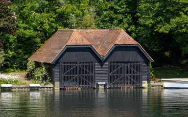 Fototapeta na wymiar wooden boat house in the river