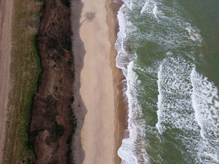 Top view aerial image from drone of an stunning beautiful sea landscape beach 