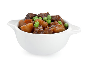 Delicious beef stew with carrots, peas and potatoes on white background