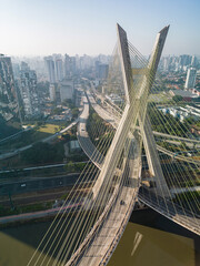 2023 view of the Pinheiros river with modern buildings beside it and the famous Octavio Frias de...