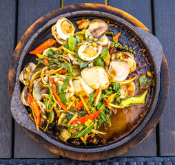 Thai food dishes in a restaurant beachfront in Hua Hin, Thailand