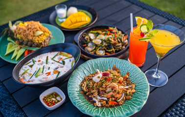 Thai food dishes in a restaurant beachfront in Hua Hin, Thailand