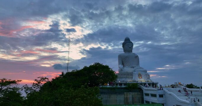 .aerial view colorful pink cloud in blue sky at sunrise or sunset at Phuket big Buddha..creative travel concept. stunning pink sky background..Phuket big Buddha is the popular landmark in Phuket..