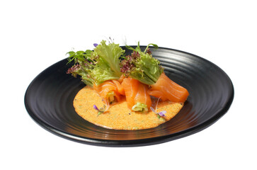 Salmon Wrap with flying fish roe spicy sauce on black plate